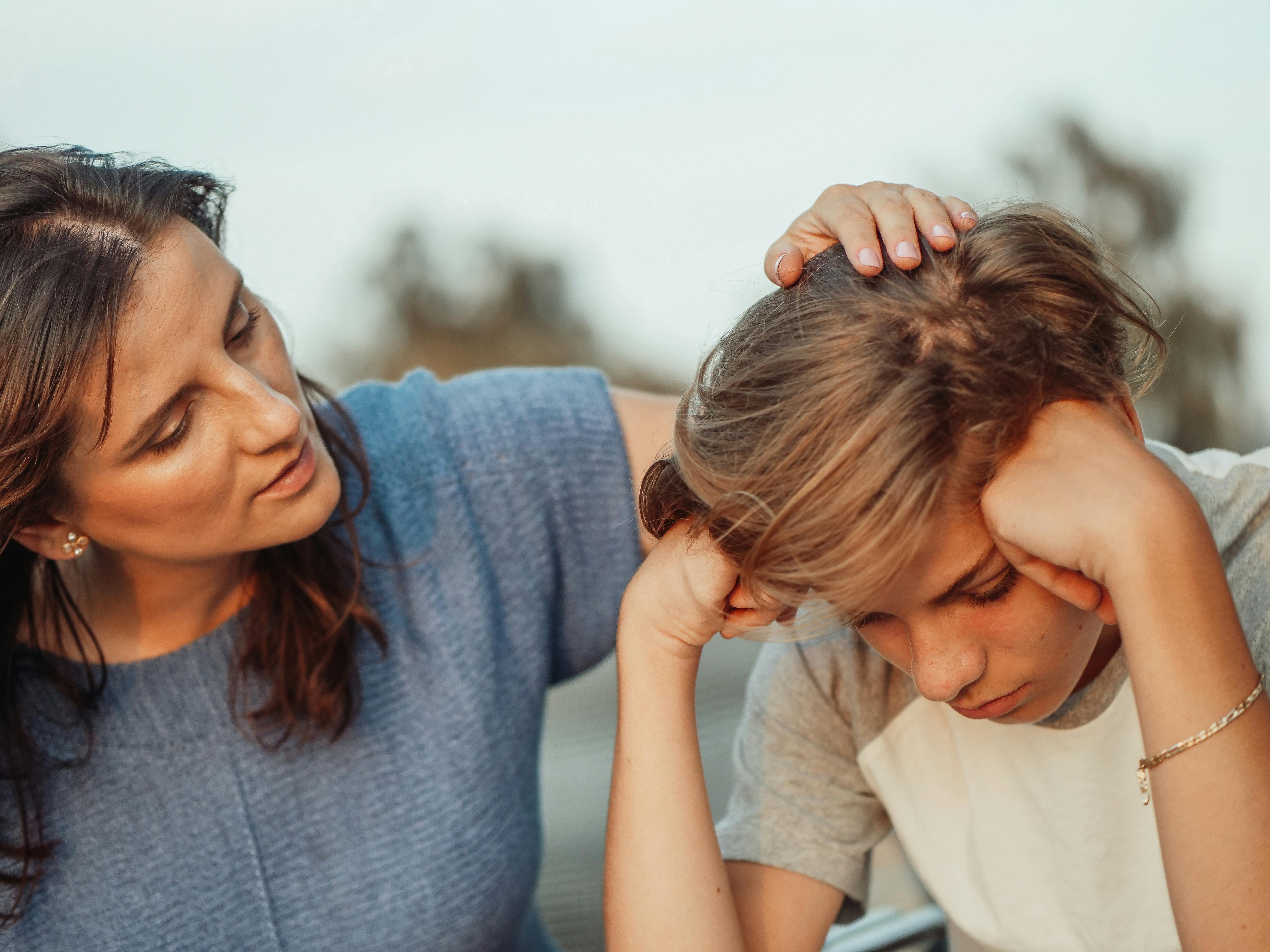 parent comforting child