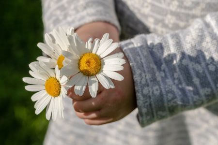girl holding flowers