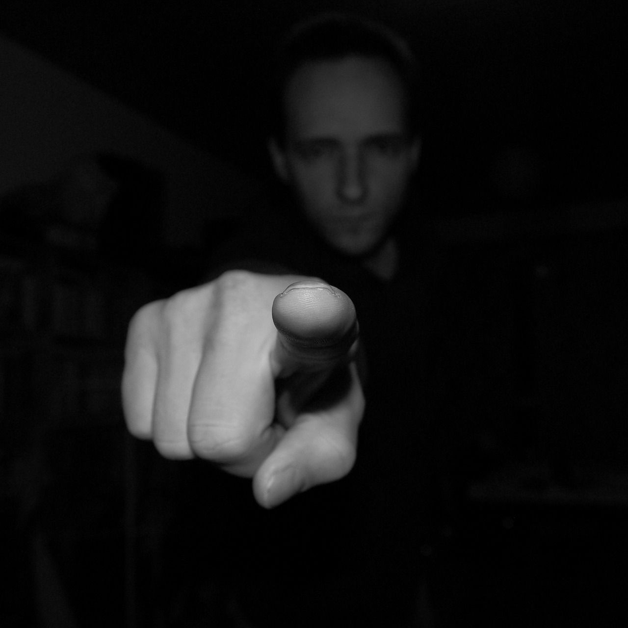 Man pointing directly at screen
