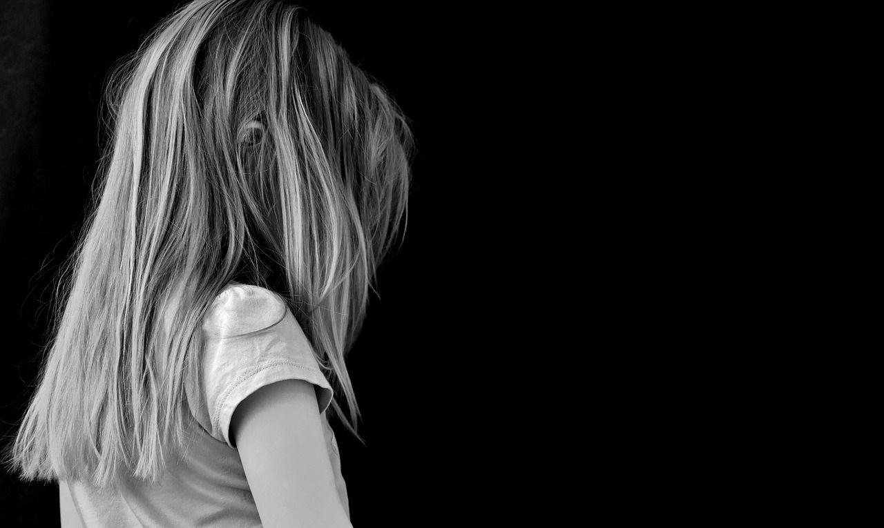 black and white child alone