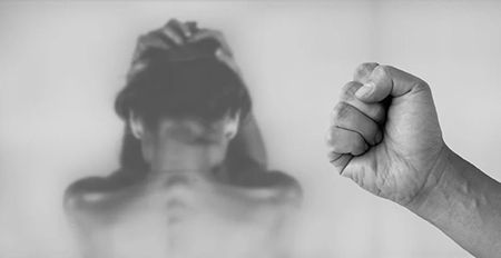 woman cowering
