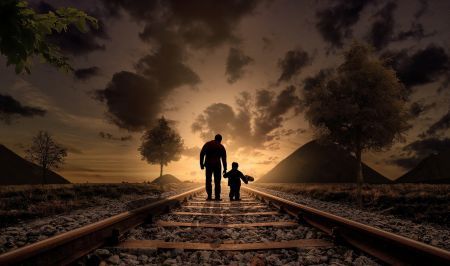 parent walking with child