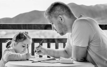 father and daughter drawing