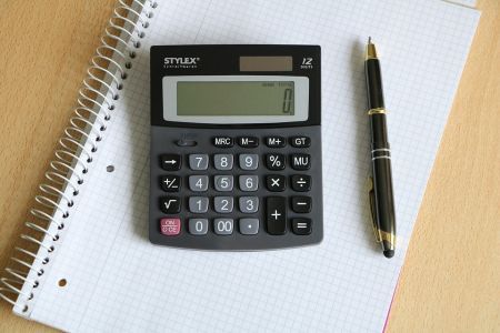 Calculator, pen, and paper