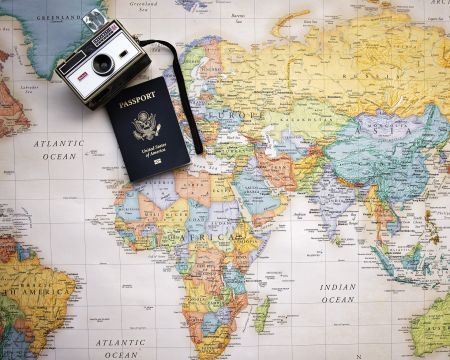 passport &amp; camera on map
