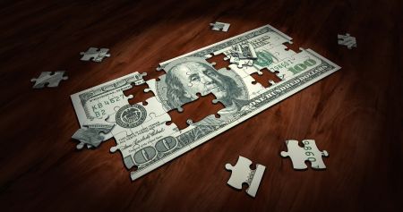100 dollar bill puzzle on floor