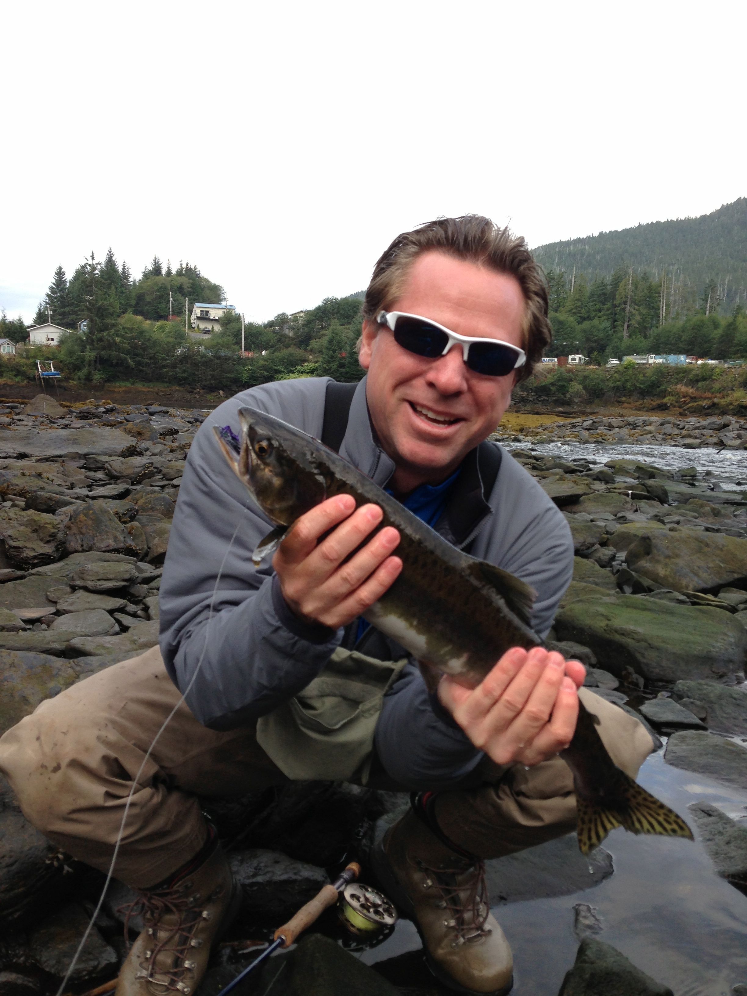 Alaska trip man holding fish