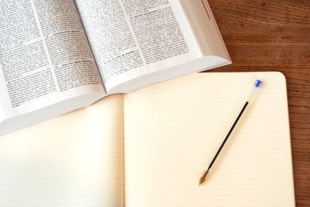 book, folder and pen